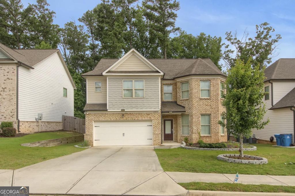 Photo of 2004 Brittlebank Lane, Lawrenceville, GA 30043 (MLS # 10753608)