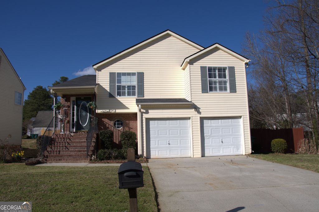 Photo of 5718 Hidden Brook Circle, Atlanta, GA 30349 (MLS # 10697470)