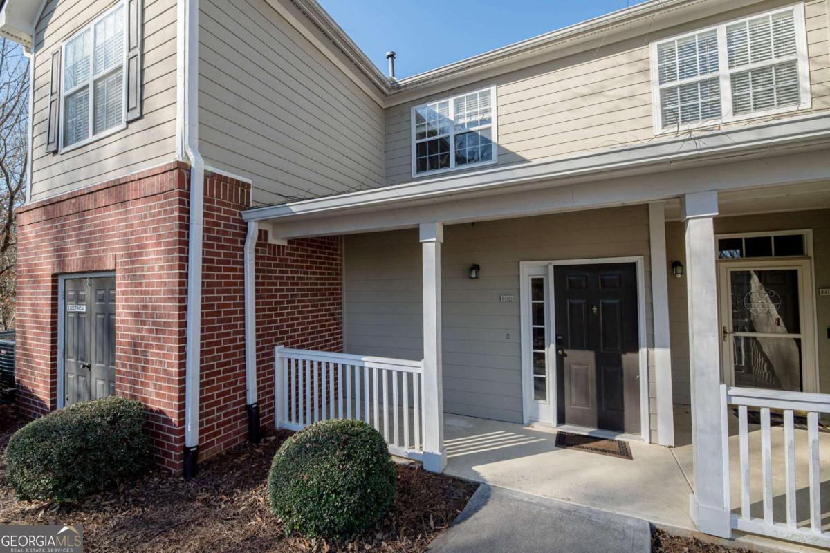 Updated End Unit Townhome in Gated Community. 2 Bedrooms and 2 Baths. The Covered Front Porch welcomes you. Open Concept Floor Plan with Soft Neutral Colors, Updated Fixtures and All LVP / Tile Flooring. Modern Kitchen features Granite Counters, White Cabinets, Tile Backsplash & Peninsula Island. Separate Dining Area. Spacious Family Room with Great Natural Light and Gas Logs Fireplace. Split Bedroom Plan with Spacious Primary Suite including Walkout Access and Large Master Closet. Master Bath boasts Double Vanity with Granite Counters and Tub/Shower Combo. Secondary Bedroom has Adjacent Full Bath. Private Balcony for Quiet Evenings & Saturday Morning coffee. Woodlands at Webb Bridge is a Manicured, Walkable Community with a Beautiful Pool. Gated Community in a Great Alpharetta Location. Convenient to 400, Avalon, Shopping, Dining, etc. Sought after Alpharetta High School.