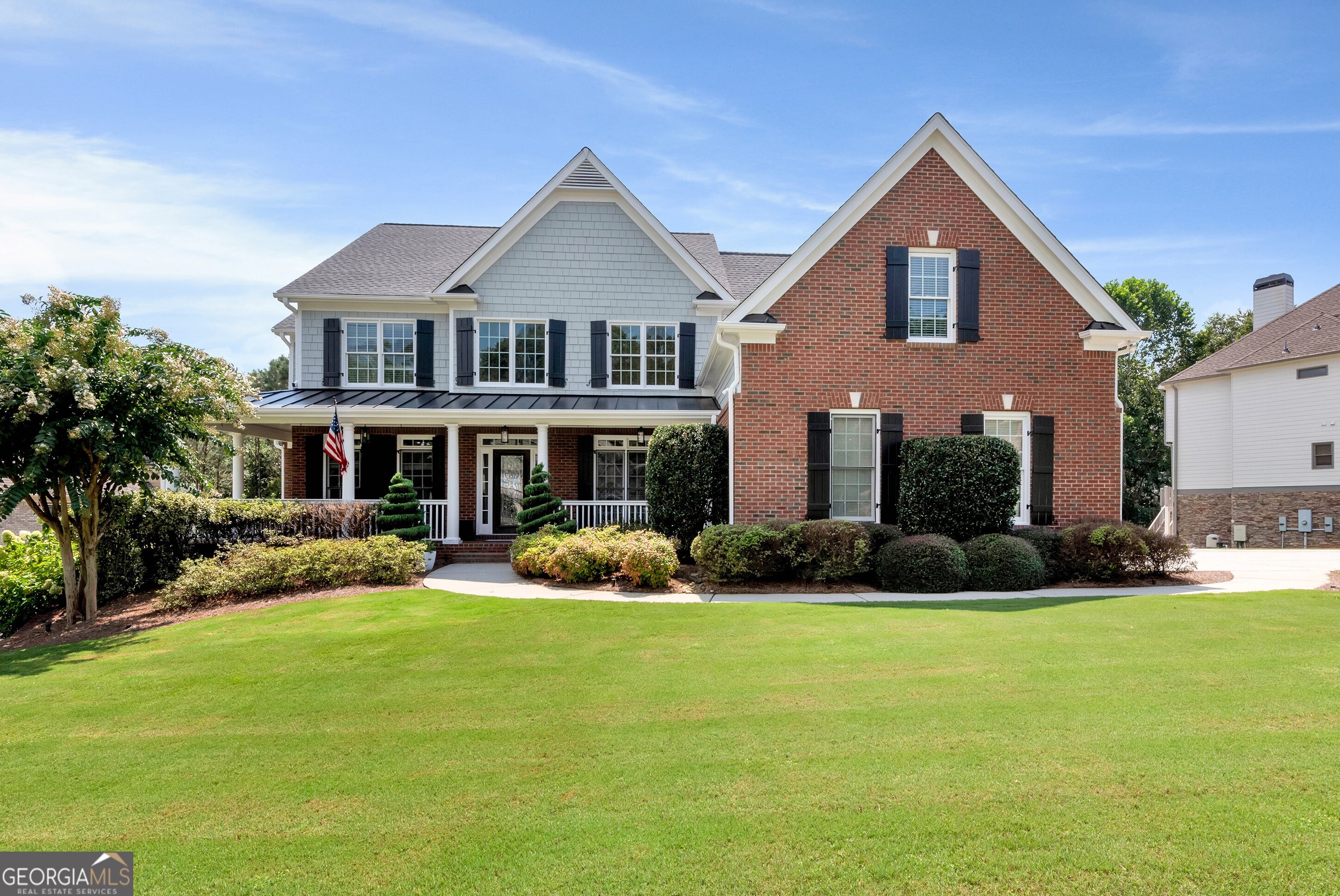 Stunning 3-Level 4-Sided Brick Estate with Heated Saltwater Pool & Designer Upgrades This exceptional home offers luxury living with thoughtful design on every level. The main floor features a primary suite on the main plus an additional bedroom with full bath, as well as a half bath for guests. White oak floors flow throughout, complementing the designer kitchen with 3 cm Matarazzo Calacatta Dolomite countertops, a ZLINE Gold Series gas range with custom vent hood, custom refrigerator/freezer, dual microwaves, and an ice machine. The main level also offers two fireplaces with gas logs, a gas firepit by the pool, and a 3-car side-entry garage with granite floors, refrigerator/washer/dryer hookups. Upstairs, you'll find four spacious bedrooms, three full bathrooms, and a large bonus room over the garage. The terrace level is designed for entertaining and wellness, featuring a full bedroom with private bath, an additional full bath for the spa/salon, a theater room, gym, safe room with gun vault, pool room, and a second master custom closet. It also includes washer/dryer hookups, surround sound, and multiple flat screen TVs. Step outside to your private resort-style retreat with a heated saltwater pool and spa complete with grotto and slide, a gas firepit, and multiple decks including a covered porch. The yard is professionally landscaped with a Hunter 6-zone irrigation system. Additional features include: Sonos sound system throughout, Nest thermostats, five security cameras plus Ring doorbell, home air purifier, and extensive smart-home technology. This home truly offers the best in luxury, comfort, and entertainment.