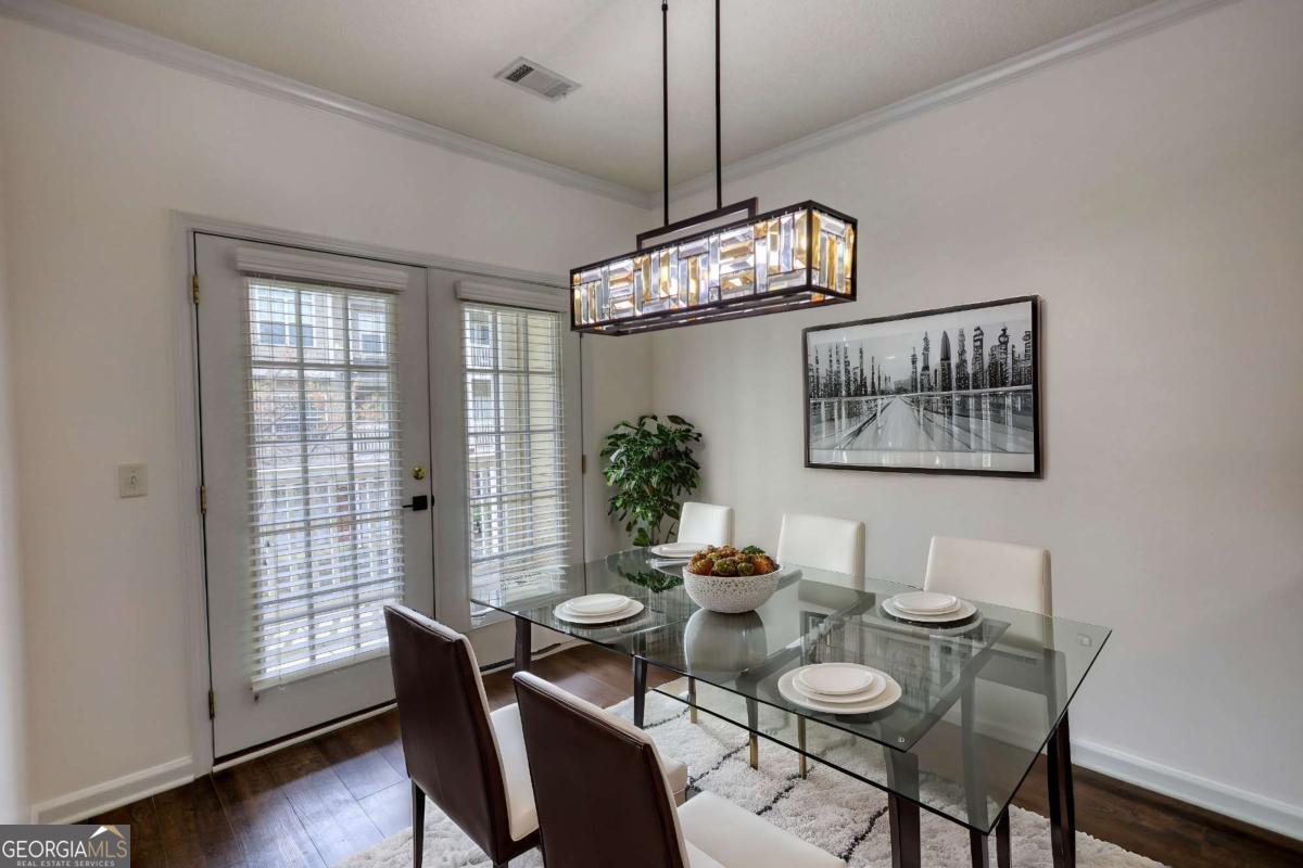Perfect for First-Time Buyers - Seller Offering $2,000 Toward Closing Costs! Vacant & ready for quick close! Stylish 2BR/2.5BA townhome in gated community just behind Avalon and walkable to downtown Alpharetta. Bright open floorplan, white Samsung Bespoke appliances (stay!), granite counters, oversized 2-car garage, private balcony, and laundry room with washer/dryer. HOA covers water + exterior maintenance. Affordable, updated, and ready to go - seller is motivated and will consider all offers!