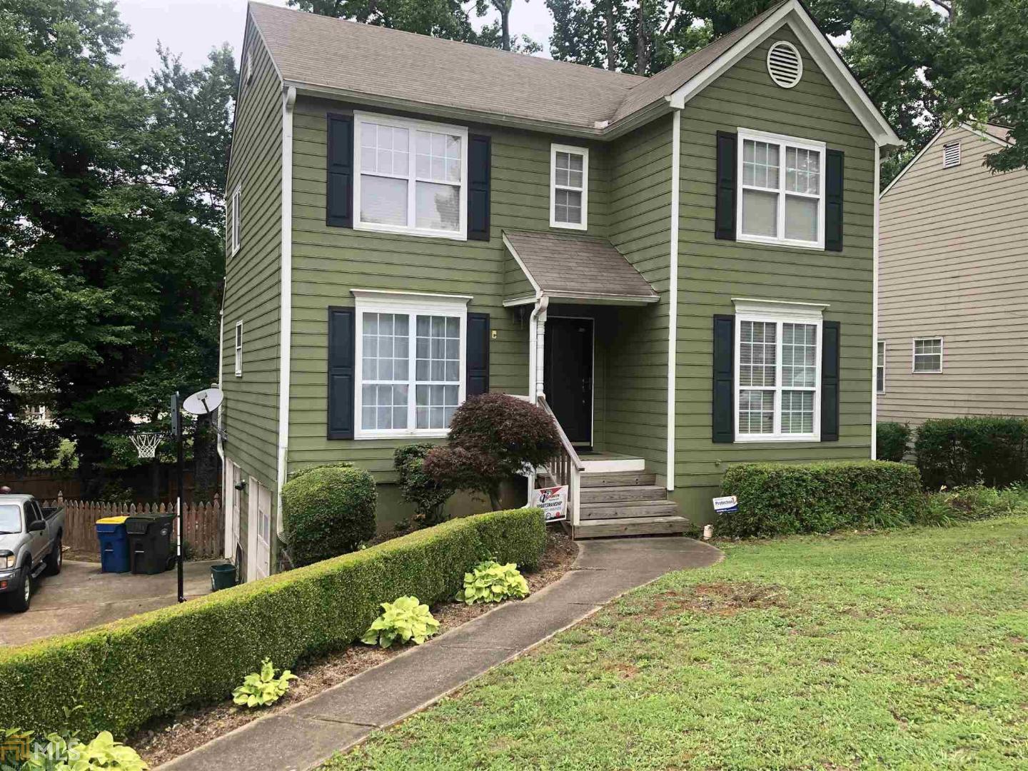 Minutes from Kennesaw State College. NO HOA Charming Kennesaw home near EVERYTHING !Great schools! Shopping! I75! From the moment you walk into the foyer you'll feel the warmth & natural flow, perfect for entertaining, big open foyer leads to a huge family room that boasts brick fireplace with view to eat in kitchen, hardwoods through out the main floor. Room to grow with 3 bedrooms & closets bigger than most in this price point! private fenced yard. Won't last long!