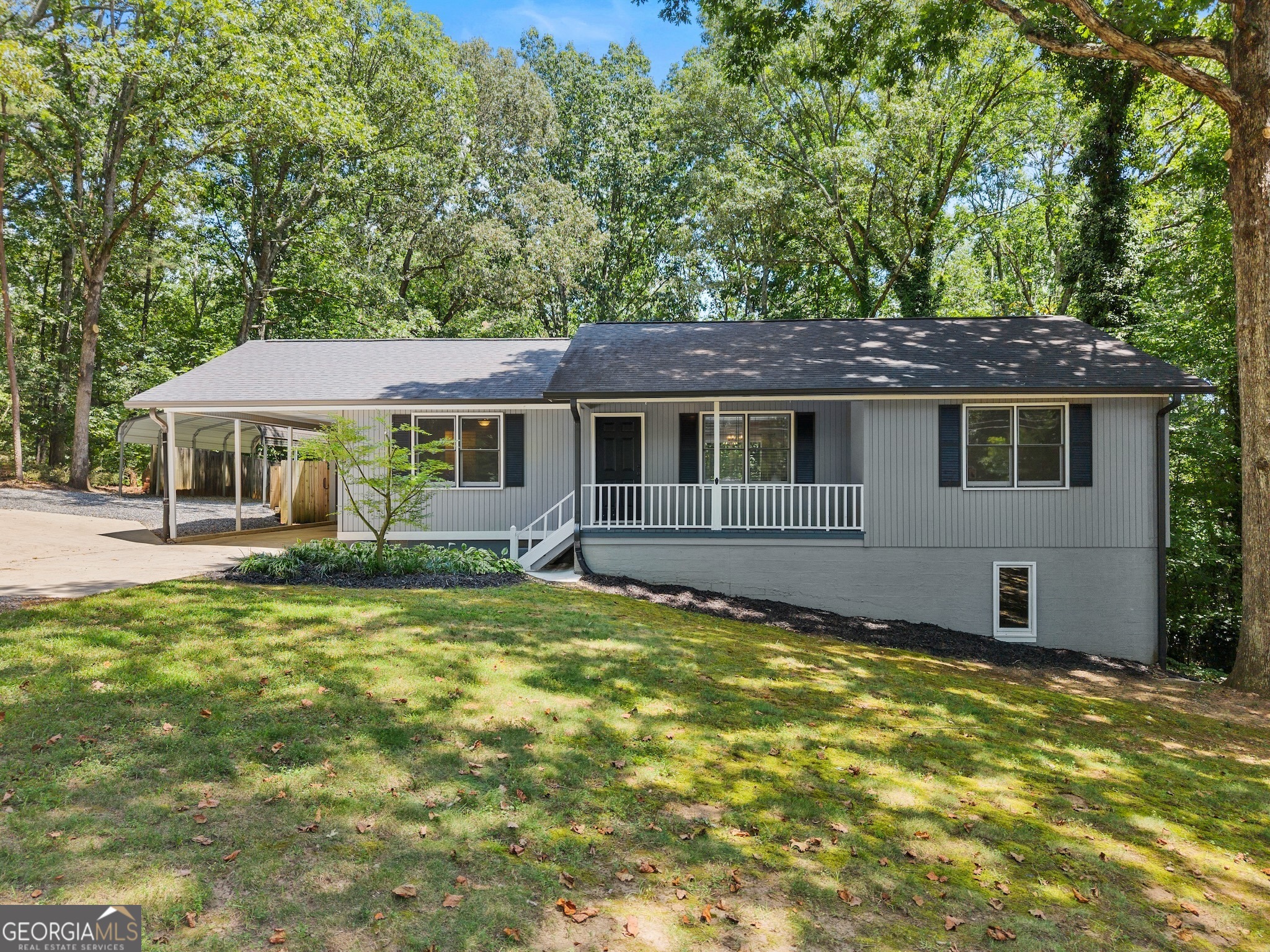 Charming Renovated Ranch on a Spacious Leveled Lot Welcome to 3651 Green Crest Rd A beautifully maintained 3 bedroom, 2 bath ranch offering comfort, convenience, and thoughtful updates throughout. Step inside from the inviting front porch and find the private primary suite tucked to the left, featuring a beautifully renovated en-suite bathroom. Across the spacious living area are two additional bedrooms and a second updated bathroom. The renovated kitchen is well-appointed with new stainless steel appliances and flows seamlessly into the dining area, which sits just in front of sliding glass doors that lead to a large back deck-perfect for entertaining or enjoying peaceful views of the expansive backyard. Additional features include a one-car attached carport, a two-car detached carport, and a half-finished basement/crawl space that offers excellent storage potential. With a large front and back yard, there's plenty of space to enjoy outdoor living. Don't miss your opportunity to own this move-in ready ranch home with modern touches and room to grow!