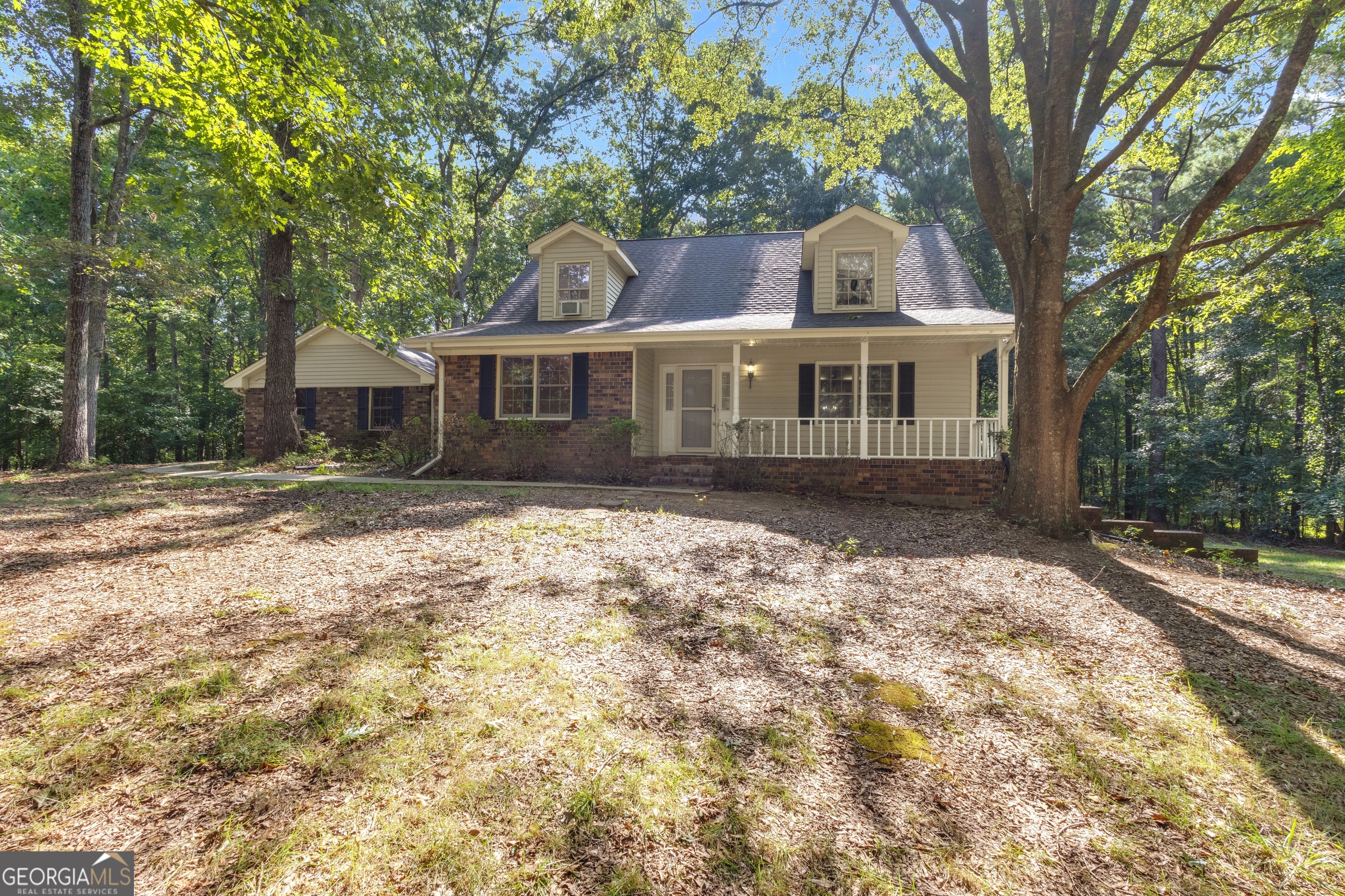 Welcome to 190 Brierwood Drive! Tucked away on a quiet cul-de-sac in a well-established neighborhood, this charming Cape Cod offers more space and flexibility than meets the eye. Step inside to find a bright, open layout with vaulted ceilings and multiple living areas that create a warm and inviting atmosphere. The main floor features a separate dining room, a spacious eat-in kitchen, and a comfortable owner's suite-all designed for easy everyday living. Upstairs, you'll find two generously sized bedrooms with ample closet space, a full bath, and a versatile bonus room perfect for a home office, hobby space, or quiet retreat. The full unfinished basement offers even more potential, with bathroom rough-ins already in place-ideal for expanding your living space or creating the ultimate rec room. With septic lines located in the front yard, there's even room to add a pool off to the side. Relax and unwind in the private backyard from the screened porch or the open deck-complete with a hot tub for year-round enjoyment. For those needing extra storage or workspace, there's a detached area perfect for a workshop or storing toys and tools. Conveniently located near McCurry Park and within the sought-after Fayette County School District, this home blends comfort, possibility, and location. Don't miss your chance to make it yours!