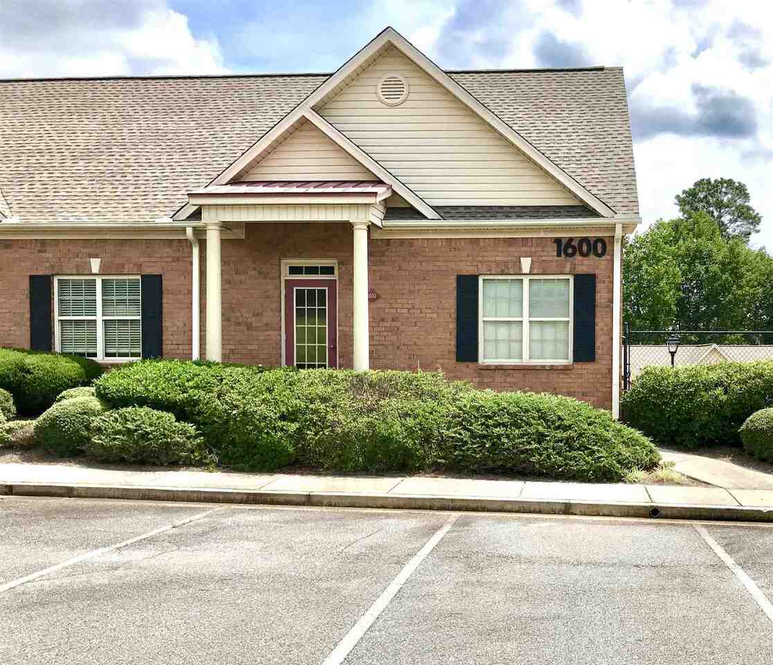 Professional furnished office condo for lease. This right sized office condo offers a large conference room space which could be used as an office if needed, two corner offices each with windows, a private restroom, kitchenette and storage. Hardwood floor entry and hallway and 9 foot ceilings with transom windows over every door. Perfect for small attorney, counselor or other professional service business. This upscale office park is conveniently located just off Peachtree Industrial in Suwanee and is a great option for a work from home office that isn't exactly at home but close by. Four sided brick exterior, new roof and ample parking lot directly in front of entrance. Directly across the street from Level Creek Elementary, walkable to Georgia Fitness and restaurants nearby. Rent includes garbage, water & sewer.