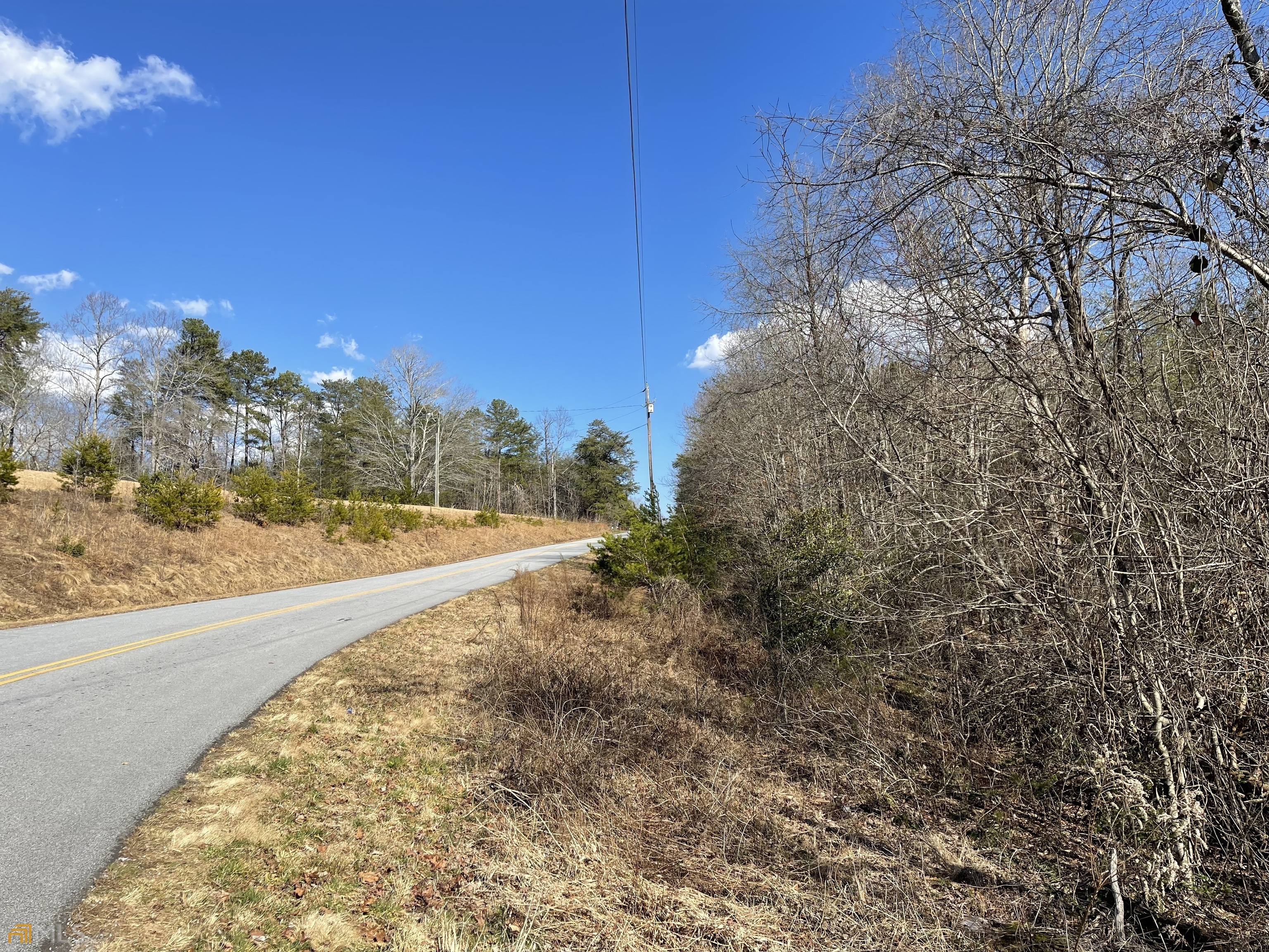 Just what you have been searching for . . . just a few yards from the Soque River is your quiet place in the woods. Bring your vision for a family farm, homestead or family compound that is just minutes north of Clarkesville and 20 minutes from Helen. This beautiful property skirts over 1200' county road frontage and has a small branch flowing through the center. The parcel remains in Agricultural Conservation and is to be sold as one parcel but could be subdivided.