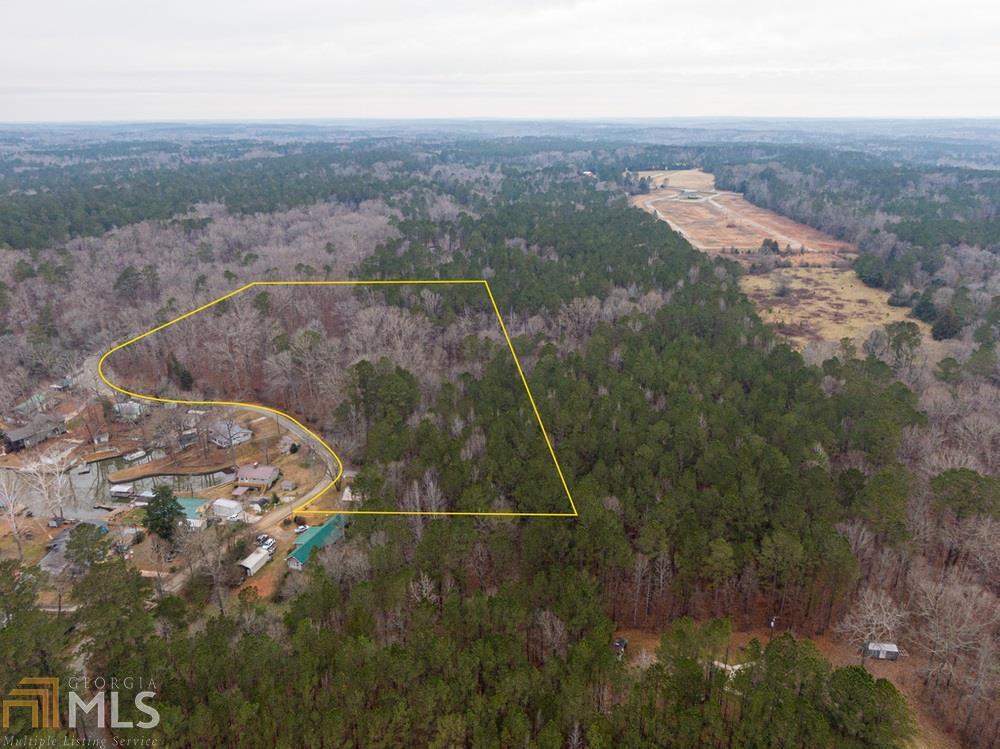 10+/- acre wooded building lot, 30x33 garage, and asphalt driveway with an amazing view of Jackson Lake. Here's your chance to have a gorgeous lake view without the lakefront price tag. Call today for more info or to arrange a private showing.