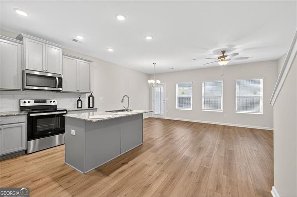 Photo of 228 Buckingham Lane, Hoschton, GA 30548 (MLS # 10705409)