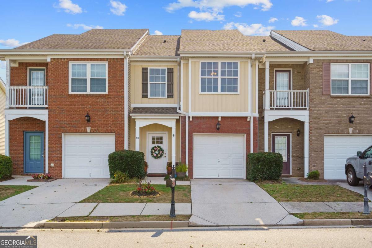 Welcome home to this beautifully updated 2-bedroom, 2.5-bath townhome, featuring dual primary suites-ideal for roommates, guests, or versatile living arrangements! Step into a warm and inviting living room with a cozy fireplace, perfect for relaxing evenings. The kitchen is a true highlight, showcasing new appliances, freshly painted cabinetry, and elegant stone countertops-a stylish and functional space for any home chef. Upstairs, you'll find two generously sized primary bedrooms, each with its own private bath, offering both comfort and privacy. The fenced-in backyard provides a peaceful, low-maintenance retreat-perfect for morning coffee, evening relaxation, or a safe space for your favorite four-legged friend to play! Located in a vibrant community with two swimming pools, a clubhouse with fitness center, dog wash station, and playground, this home offers a wonderful balance of comfort and convenience. Nestled in Dawsonville, just minutes from GA-400, shopping, dining, and the North Georgia Premium Outlets-enjoy the best of peaceful living with easy access to Atlanta and beyond.