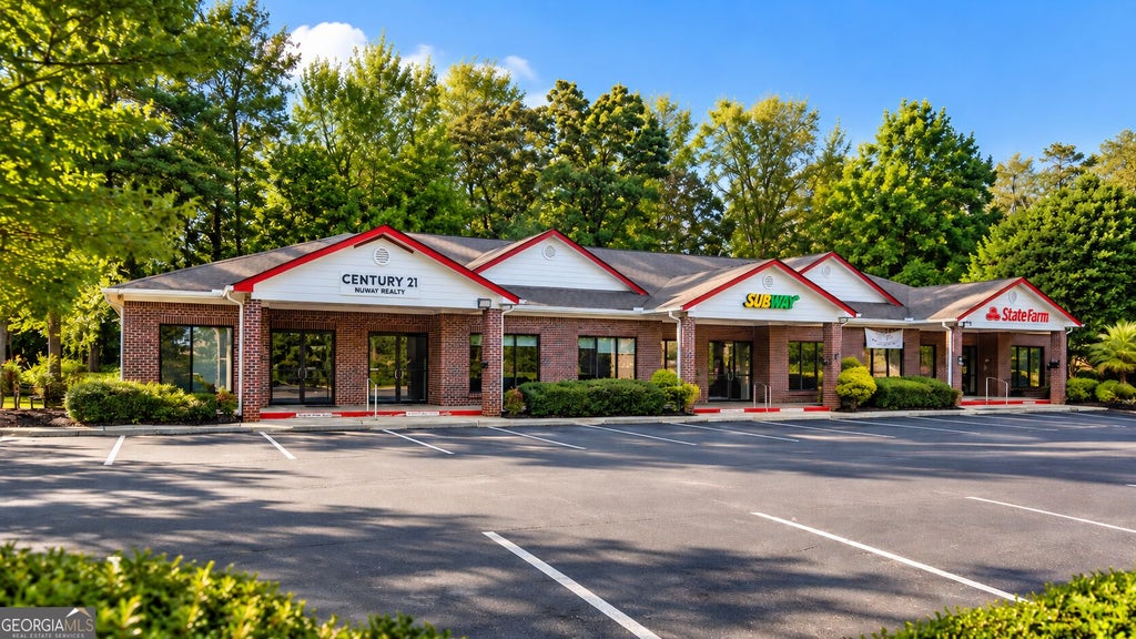 Photo of 3100 Highway 16 E, Sharpsburg, GA 30277 (MLS # 10853746)