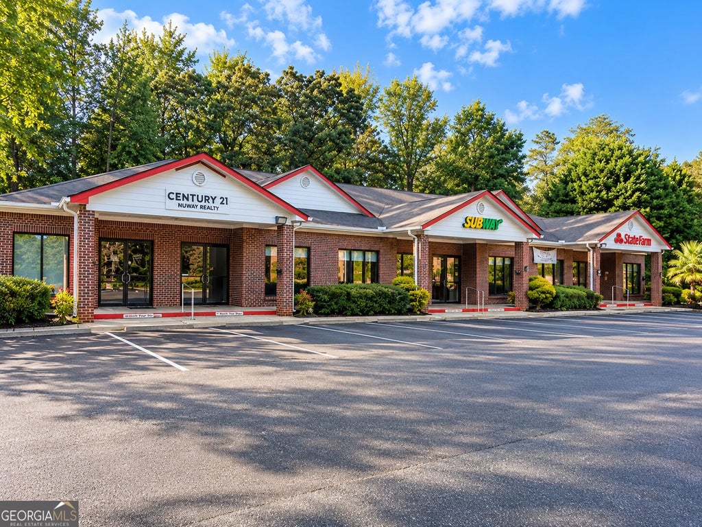 Photo of 3100 Highway 16 E, Sharpsburg, GA 30277 (MLS # 10853746)