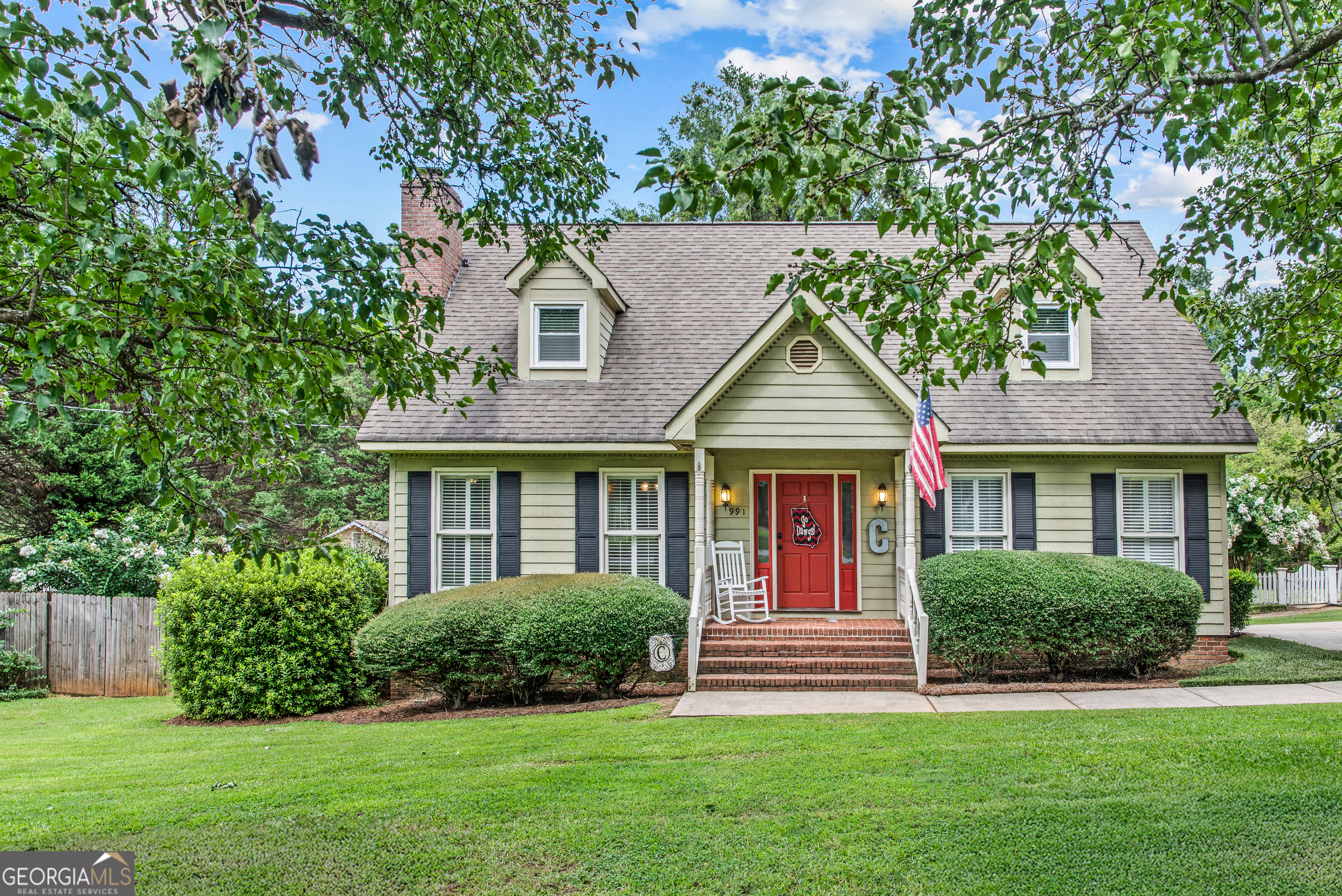 Nestled on a picturesque lot in Madison's sought-after in-town neighborhood near historic Hill Park, 991 Crawford Street offers the perfect blend of charm, comfort, and convenience. Welcomed inside to a bright, open floor plan where the living room seamlessly flows into the kitchen and sunroom. The eat-in dining area, framed by a wall of picture windows, invites you to enjoy tranquil views of your private backyard oasis. The main level features a spacious primary suite with a beautifully renovated bathroom, while the second floor offers two oversized bedrooms and a full bath-ideal for guests. Outdoors, your personal retreat awaits. A covered back porch overlooks a sparkling saltwater pool with a brand-new liner, complemented by a charming pool house complete with a half bath, cozy sitting area, and space for a beverage fridge. The fenced backyard provides the perfect setting for entertaining or simply unwinding in peace. Conveniently located, quick access is provided to the coveted Hill Park's playground, greenspace, tennis and pickleball courts, and newly updated public restrooms, this home is also moments from downtown Madison's shops, restaurants, the aquatic center, library, and all four public schools. This is more than a home-it's an in-town lifestyle you'll love.
