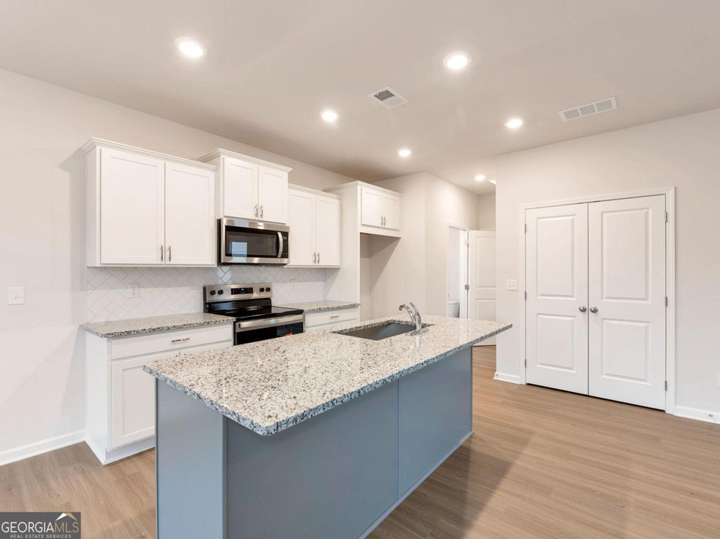 Photo of 161 Millers Lane, Calhoun, GA 30701 (MLS # 10846255)