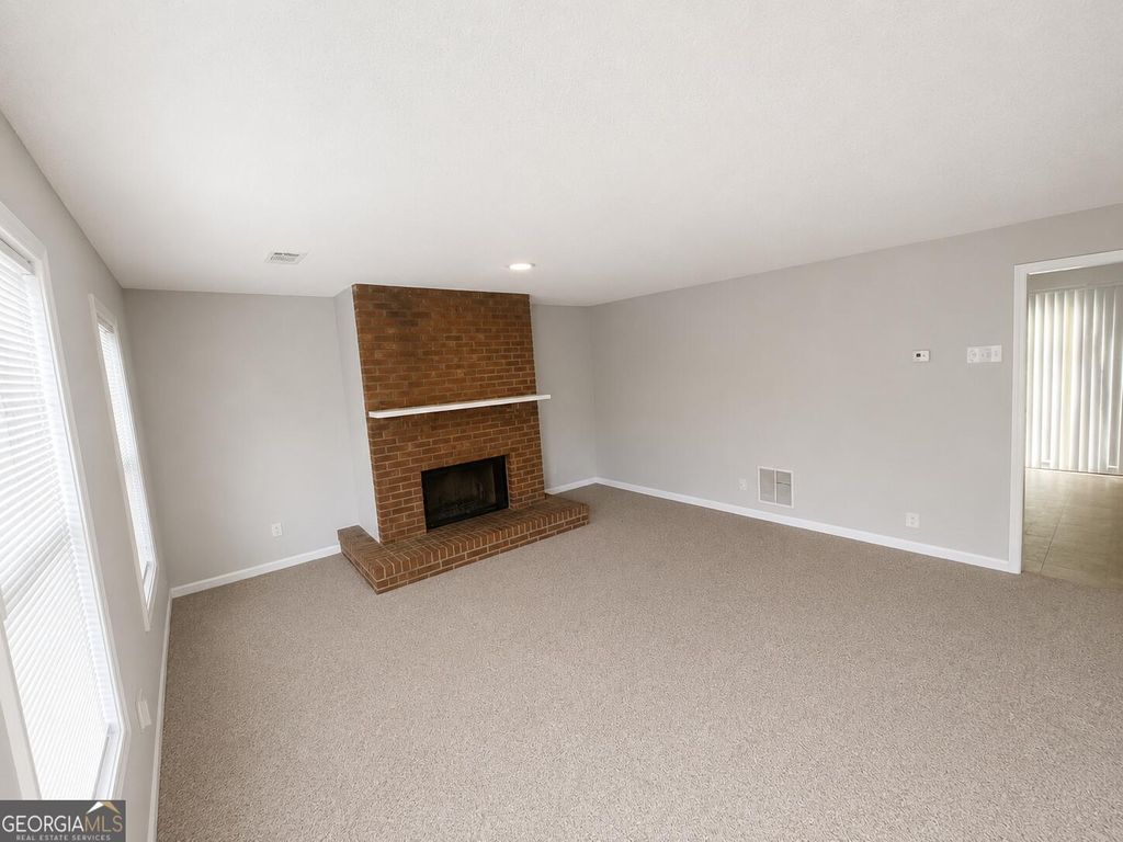 Photo of 5588 Windwood Road, Atlanta, GA 30349 (MLS # 10769401)