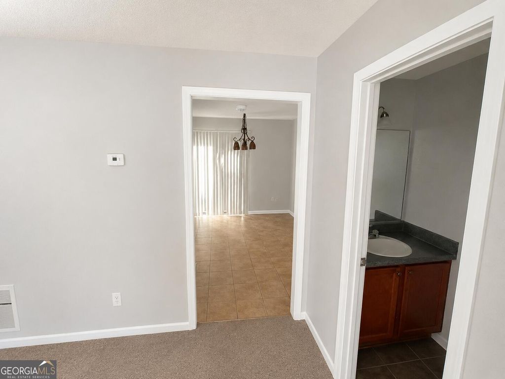Photo of 5588 Windwood Road, Atlanta, GA 30349 (MLS # 10769401)