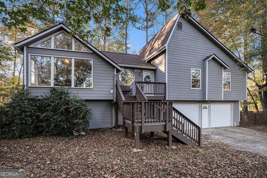 Welcome home to this wonderful property with a great location, and lots of space. If you have a growing family, or just need a home gym, this is the place for you. This lovely split level home features 3br/4br and 3 full baths, a large fenced in yard, great for kids and/or pets, a brand new roof, and lots of other features too great to miss out on. The location is second to none. If you need quick access to I-75 or I-285, then this home is for you.