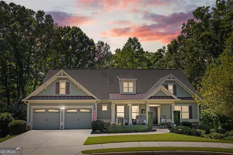 Exquisite Ranch Retreat on Premium Creek Lot in Seven Hills (55+ Cedarcrest Community). Absolutely stunning and better than new, this 4-bedroom, 3-bath ranch with a bonus/office space on a full finished basement offers luxury living in the highly sought-after Windsong section of Seven Hills. Perfectly designed with elegance and comfort in mind, this rare ranch showcases rich hardwood floors throughout, high-end finishes, and an open, light-filled floor plan. The gourmet kitchen seamlessly connects to spacious living areas and private outdoor spaces, making entertaining effortless. Relax on one of two covered porches-one screened, the other enhanced with a dry underdeck system-while enjoying serene views of Pumpkinvine Creek. Downstairs, the full finished basement expands your living options with a kitchenette, additional living room, and plenty of space for recreation or guests. The lush, professionally landscaped cul-de-sac lot provides a retreat-like setting and includes a $75,000 premium creek lot upgrade, adding both beauty and value. Unlike most homes in this 55+ community, this residence is fully detached, offering true privacy while still giving you access to vibrant amenities such as swim, tennis, sidewalks, and more. Conveniently located near top-rated schools, shopping, dining, and premier medical facilities, this one-of-a-kind home truly has it all.