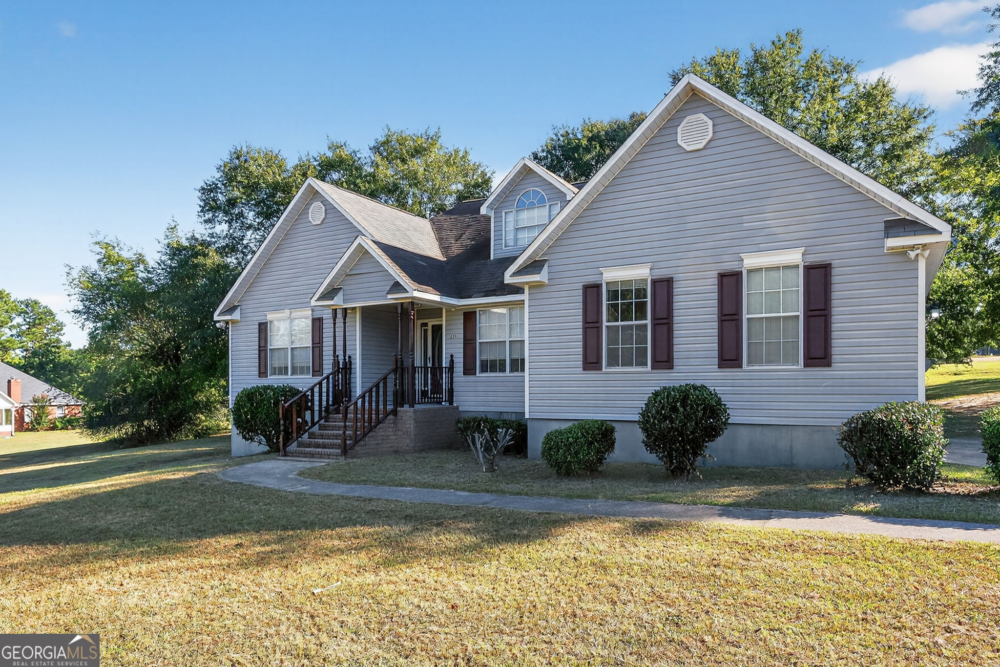 Imagine waking up to the soft sounds of nature and stepping outside to nearly an acre of open space-all yours. This 3-bedroom, 2-bath retreat sits proudly on a corner lot where fresh country air greets you every morning. Inside, newly painted rooms feel bright and welcoming, ready to host everything from quiet coffee moments to lively family dinners. Children can run and play, pets can roam free, and gardens can flourish. It's the best of country living-peaceful, spacious, and close enough to town for convenience. Here, every day feels like a getaway.