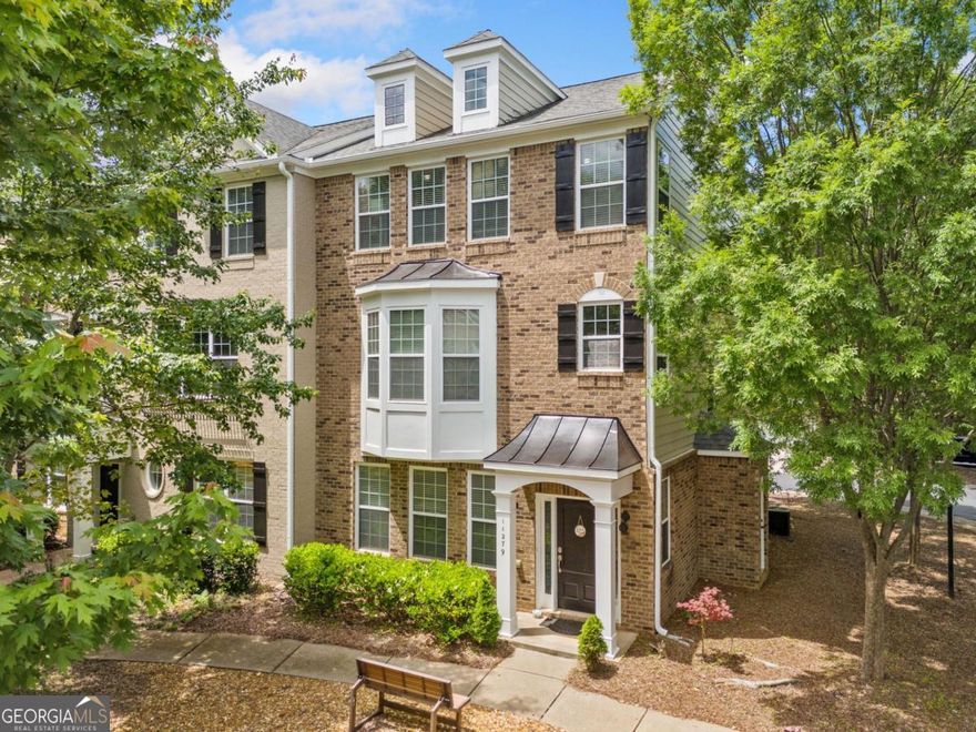 Beautifully updated 3-bedroom, 3.5-bath end-unit townhome in the desirable Westside Villas community in Alpharetta. This bright and spacious corner home features brand new luxury vinyl plank (LVP) flooring on the main level, including the living room, dining area, and kitchen. Plush new carpet adds comfort to all bedrooms and stairways, while LVP continues in all bathrooms, the laundry room, foyer, and hallways for a clean, modern finish.    The kitchen is outfitted with sleek LG ThinQ smart appliances, combining style and functionality. Just off the main level, enjoy a private deck, perfect for morning coffee or evening entertaining.    Upstairs, youCOll find three generously sized bedroomsCoeach with its own bathCoincluding a serene primary suite. The finished terrace level includes a full bath and a flexible bonus room, ideal for a home office, guest space, or media room (not counted as a bedroom).    Located just minutes from Avalon, Downtown Alpharetta, and Alpha Loop, you'll enjoy endless dining, shopping, and entertainment options. Spend weekends browsing local boutiques, dining al fresco, or catching live music at Brooke Street Park. Easy access to GA-400 makes commuting a breeze, and top-rated schools are nearby.    This move-in-ready home blends comfort, smart features, and unbeatable locationCoperfect for modern Alpharetta living.