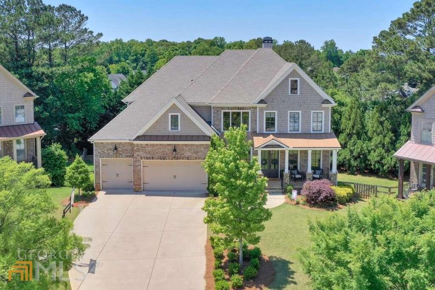 This is THE ONE you have been waiting for! 2015 construction with high ceilings and open floor plan in award-winning East Side/Dodgen/Walton schools. 5 beds/4 full baths. Main level features richly stained hardwood floors, custom white cabinetry, Wolf and Jenn Air appliances, huge pantry, locker style mudroom, built-in desk/mail center, butler's pantry, office, formal dining room, and private guest suite. Primary suite upstairs features vaulted ceiling, sitting area, and fabulous bath with marble tile, soaking tub and impressive his/hers closet. 3 additional bedrooms upstairs, all with en suite baths with marble countertops. Massive unfinished basement includes a ninja course and 40 ft batting cage, custom-built by Better Baseball. Fully fenced yard with large side yard. Close to Indian Hills Country Club and all of the action in East Cobb!