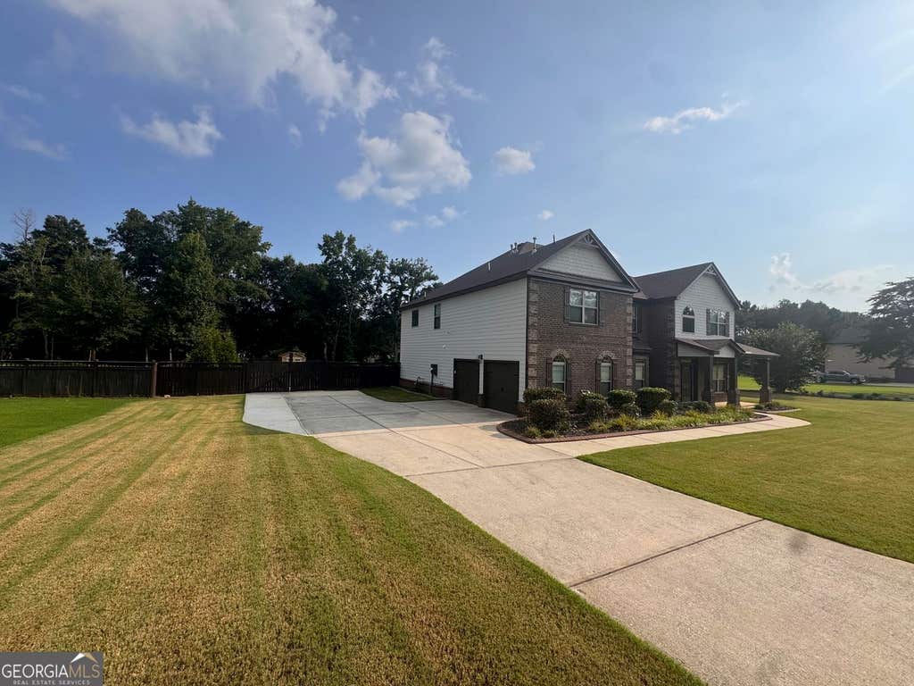 Photo of 130 Ravens Landing, Fayetteville, GA 30215 (MLS # 10816067)