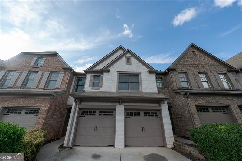 Located in a highly sought-after gated community, this stunning three-side-brick townhouse offers both comfort and convenience in one of the best locations available. The area is known for its exceptional safety and access to top-rated schools, making it an ideal choice for families. Step inside to find fresh paint throughout and brand-new carpet upstairs, giving the home a bright and inviting feel. The spacious master suite features a generous layout and an oversized bathroom, while all bathrooms are thoughtfully designed for comfort and functionality. The large kitchen is perfect for cooking and entertaining, complete with a gas stove and ample storage space. Laundry units are conveniently located inside the townhouse for easy access. With a prime location, beautiful finishes, and a welcoming community, this home is a rare find.