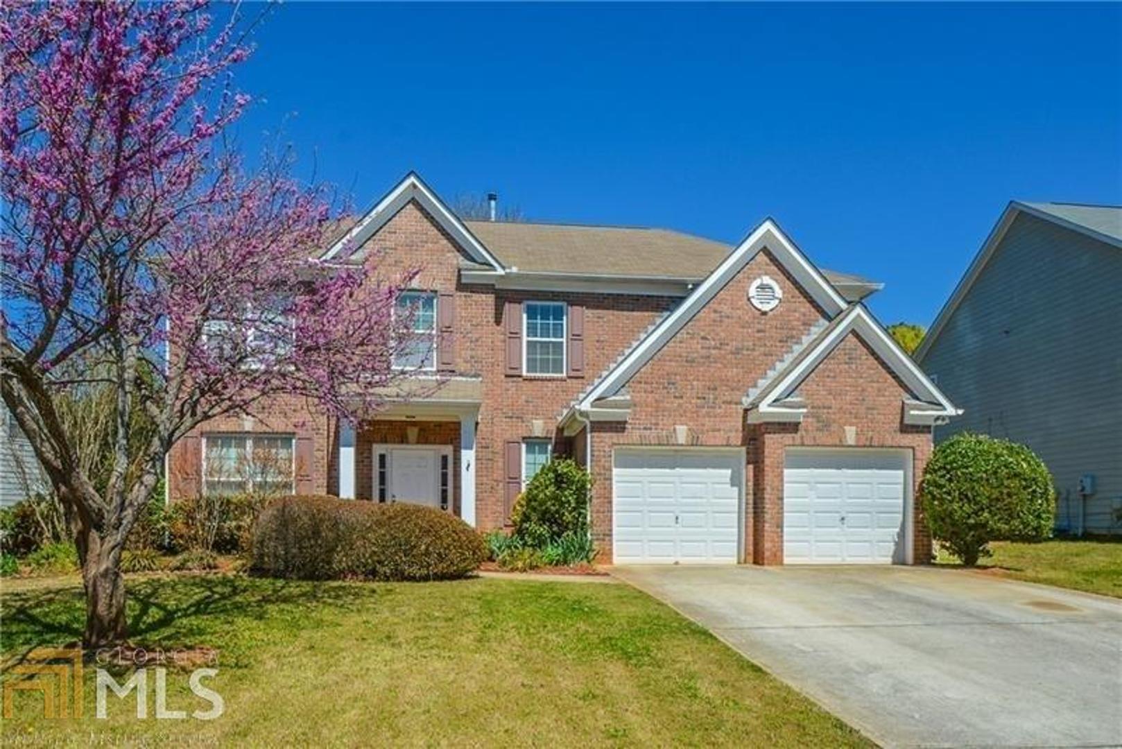 Welcome to this 4 bedroom, 2.5 bathroom brick front home with a large fenced backyard. With wood floors, new carpet, fresh paint, stainless steel appliances, new granite countertops, large master bedroom, walk-in closet, separate tub and shower, this home won't last long at this price point.