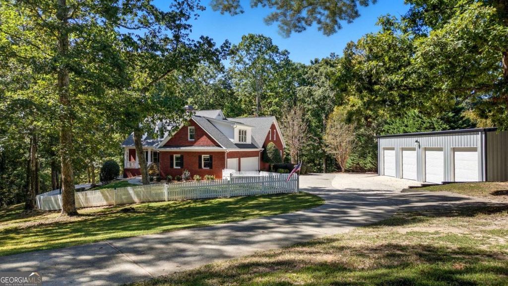 Photo of 5755 Hopewell Road, Cumming, GA 30028 (MLS # 10688275)