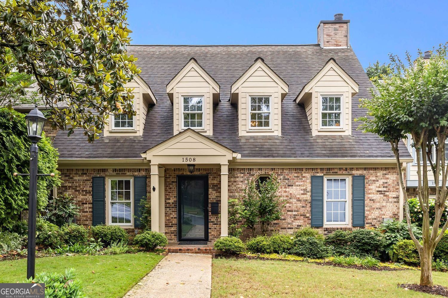 Welcome Home! Beautifully renovated condominium in desirable Brianwood community offers bright spacious living convenient to Emory, New Children's Health Care of Atlanta, CDC, Decatur, Mid-town, Buckhead and beyond! Enjoy the convenient location this condo has to offer: walk to restaurants, schools, shops, businesses, nature trails, parks, playgrounds and so much more! Enjoy the seasonally heated pool, Clubhouse and private forest of Brianwood. As you enter this unit under the custom portico, you will appreciate the spacious foyer, hardwood floors, newer windows, updated eat-in kitchen, living room with fireplace and bookshelves, separate dining room, light-filled sunroom overlooking the private back of the unit, main-level bedroom or office and fully renovated bathroom. Upstairs, two spacious suites offer plenty of light, closet/storage space, and beautifully renovated bathrooms. The double garage level offers a workshop, space enough for a workout area, video/playroom or office and a lovely green space to garden. This unit offers so much! Enjoy easy carefree living in this much sought after community. A must see!