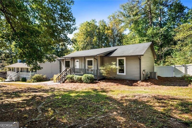 Photo of 3409 Hogan Drive NW, Kennesaw, GA 30152 (MLS # 10874573)