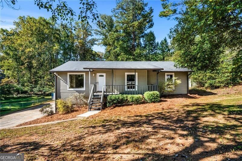 Photo of 3409 Hogan Drive NW, Kennesaw, GA 30152 (MLS # 10874573)