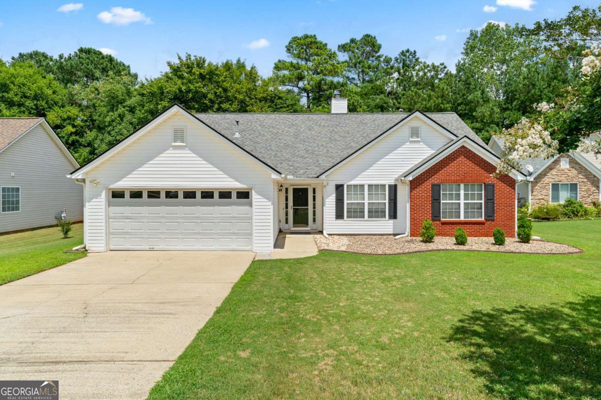 Immaculate home in this sought-after Community of Harbins Plantation. Inside, you'll appreciate the beautiful hardwood floors, high ceilings, and detailed finishes. With windows galore, the main living spaces are enveloped in light and comfort. This home is perfect for entertaining. The kitchen is the heart of the home and has enough room for multiple cooks - complete with a gas cooktop, solid-surface counters, SS appliances and tiled backsplash. The dining room is connected to the kitchen making it convenient to go back and forth between. The master bedroom is connected to a large walk in closet and a beautiful master bath with a double vanity, separate shower and tub, and tiled floors. This home also includes two generously-sized secondary bedrooms and 1 full bath. For outdoor entertaining, you'll delight in the large patio and fenced in backyard with a play set that is great for kids!