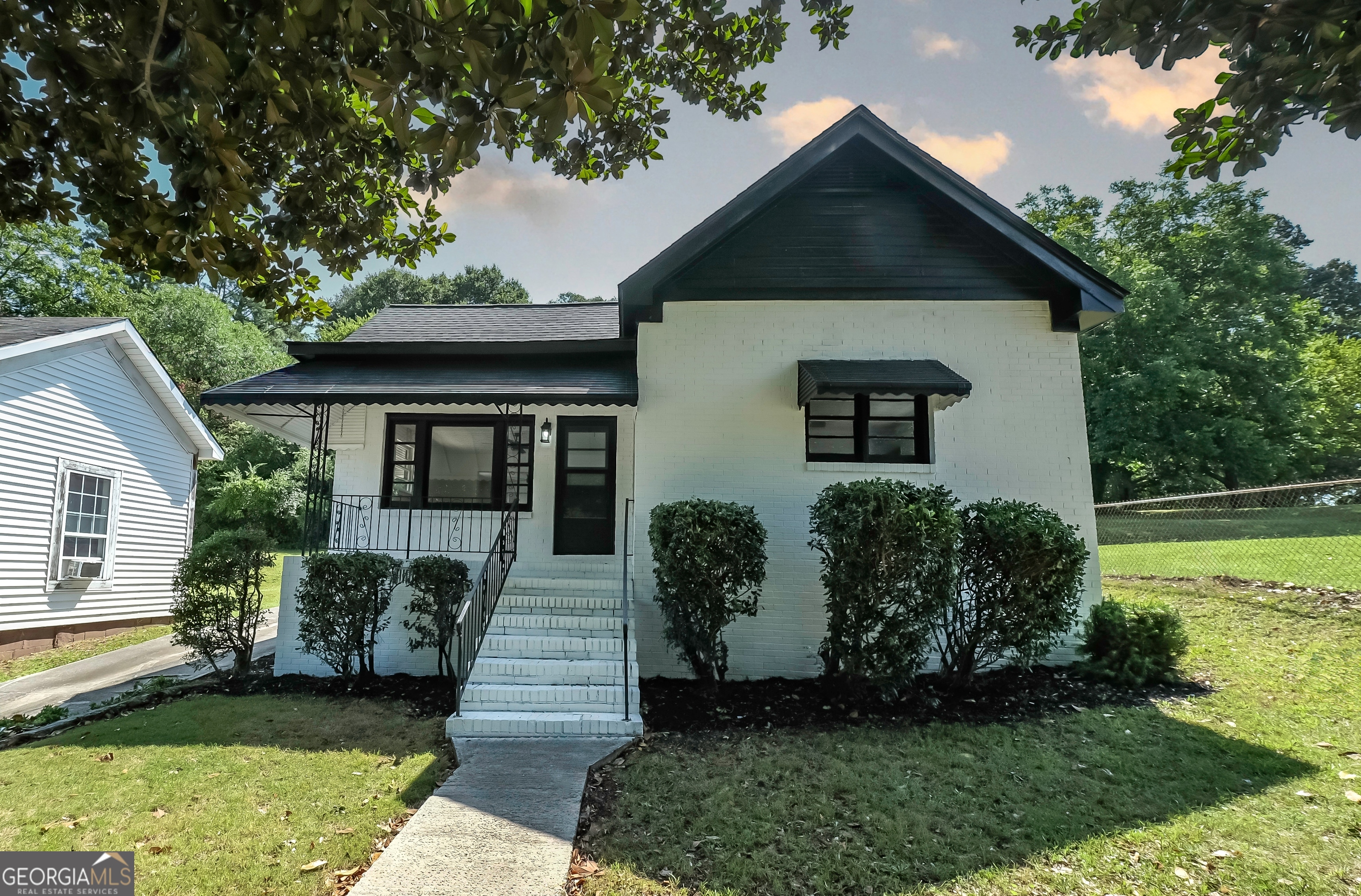 Beautifully remodeled brick home with a detached garage. Enter through the spacious living room with a beautiful picture window, joined by the separate dining room that flows into the updated kitchen with new shaker cabinets and stainless steel appliances. Easy access to the laundry room and back yard from the kitchen. 3 bedrooms and 2 newly updated baths. Home updated with LVP waterproof flooring, new wiring, new plumbing, new sheetrock, new interior and exterior paint. Lots of room for ease and comfort.