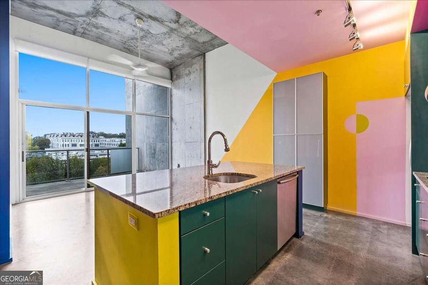 Creative's retreat in the sought after Arizona Lofts 2 (AZ2) Condominiums on the cusp of Kirkwood and Edgewood. This incredible top floor corner 1 bed/1 bath unit offers 800 square feet of living space, has custom designer touches throughout and has been featured in national publications like Architectural Digest and Domino Magazine. Open plan living at its finest, the beautiful kitchen with large center island, stainless steel appliances, stone counters and custom tile work overlooks the light flooded living space with floor to ceiling windows with access to the private balcony with tree top views of the city as well as the separate dining space. The generously sized bedroom has a large walk in closet with custom built ins and the laundry closet outfitted with a full size stackable. The luxurious spa-like bathroom offers a gorgeous standalone soaking tub, an oversized shower and a separate water closet. AZ2 has world class amenities including a stunning pool with cabanas, club room, fitness facility, dog park and roof top patio and is conveniently located within walking distance to shops, restaurants, trails, parks and the Edgewood Marta line. 1 gated parking spot included.