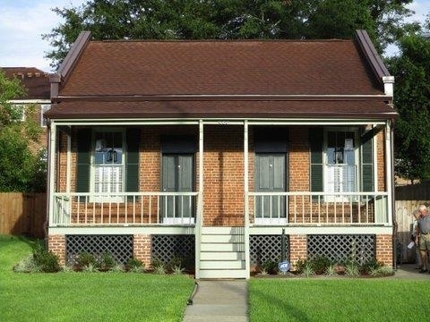 Adorable Ante-Bellum cottage (one of three in a row) that has been carefully and thoroughly renovated with new Kitchen and Bath, and all new finishes, etc. Beautiful floors, tall ceilings in LR, DR and Main BR, New ceramic floors in Sunroom, Kitchen and Bath. All new Sunroom and landscaping front and back. Private, totally fenced back yard, off street parking for 2 cars. Ready to move into with no worries. Just a few blocks from Downtown, Mercer, dog park etc. Beautiful sunset view from front porch