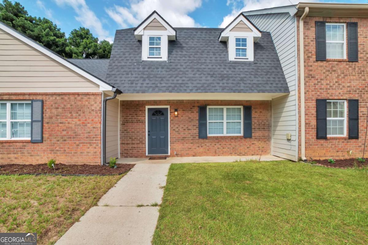 Totally Renovated End Unit Townhome 1/4 mile from Southern Regional Medical Center with No HOA restrictions! Everything is new on this charming ranch style home. Brand new 30 year architectural roof, Hardie plank siding and gutters. New insulated windows and R-38 attic insulation=Low utility bills! No HOA fees or covenants. New natural gas water heater and low flow fixtures. New LVP flooring, light fixtures and paint throughout. Beat the heat with the brand new HVAC and ceiling fans in every bedroom. Great neighborhood and excellent, convenient location. Private back yard with large storage closet and wide 2 car driveway.