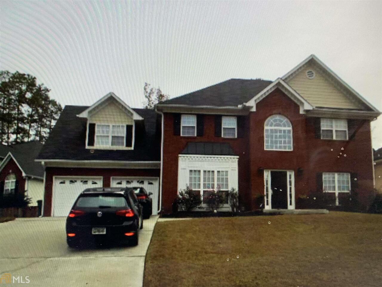 Newly renovated 4 BR Brick home located in sought after Hillgrove High School District! All NEW: Paint, roof, water heater, backyard fence, HVAC, and Hardwoods throughout main level. 2 story foyer entrance and 9' Ceilings on Main! Kitchen cabinets and countertops are being updated next week. You will Love this brick home & the area- Barrett Parkway, Silver Comet Trl, Shopping & Dining! Main Level features a Family Rm & an Office or Living Rm & Formal Dining. Upstairs are 4 good sized BR's & impressive master. Don't miss the backyard finished office/workshop with HVAC!