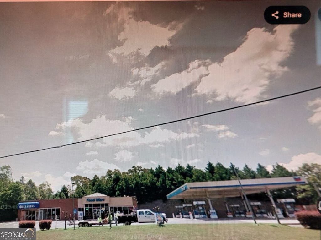 Photo of 429 Buford Highway, Sugar Hill, GA 30518 (MLS # 10766237)