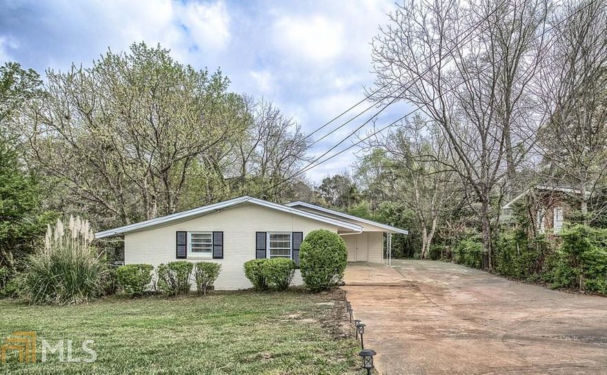 Home located in one of the hottest neighborhood in East Atlanta.  This all brick 3BE/1BA has lots more potential. Nice layout with good size rooms.  Home recently renovated top to bottom new Roof , kitchen and bathroom recently renovated.  Easy floorplan ranch floorplan with potential  to add master suite.  Get ready for those summer outings on this nearly half acre oasis we didn't forget a man's best friend home has a  dog run.  Do your research and you will see what a deal this home is.  Instant equity don't walk run to view this home
