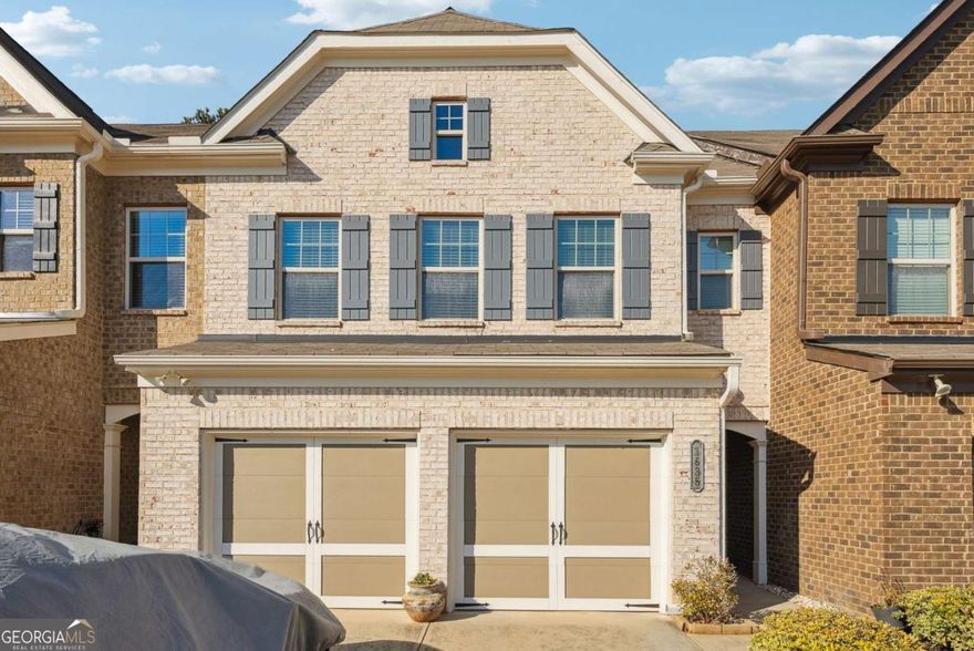 Welcome to the desirable Bridgehampton community, conveniently located at Exit 12B on Hwy 400, offering quick access to major IT hubs near Exit 11 (Windward Pkwy). This impeccably maintained 3 bedroom, 2.5 bathroom townhouse is ready for you to call home. Step inside to discover a bright, inviting living space featuring hardwood floors, updated finishes, and a welcoming ambiance. The spacious kitchen is equipped with modern appliances, ample counter space, and a cozy dining area. The primary bedroom provides a tranquil retreat with a generous closet space. Step outside to enjoy the wooded view and embrace the excellent energy efficiency of this home.    Located in a friendly neighborhood, you'll appreciate the nearby tennis courts, pool, and the natural surroundings ideal for nature enthusiasts. Additionally, this townhome offers close proximity to a variety of restaurants, top-rated schools, and more. Don't miss out on this opportunity-schedule your showing today as this home is sure to sell quickly!