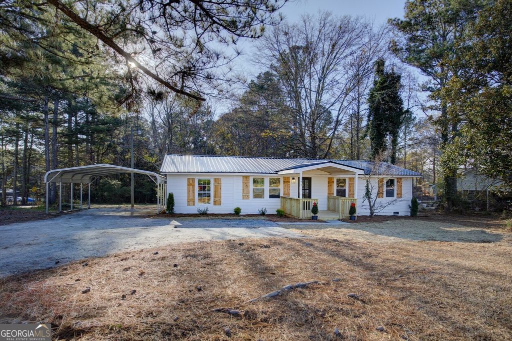 Photo of 144 Flat Rock Rd, Oxford, GA 30054 (MLS # 10660741)
