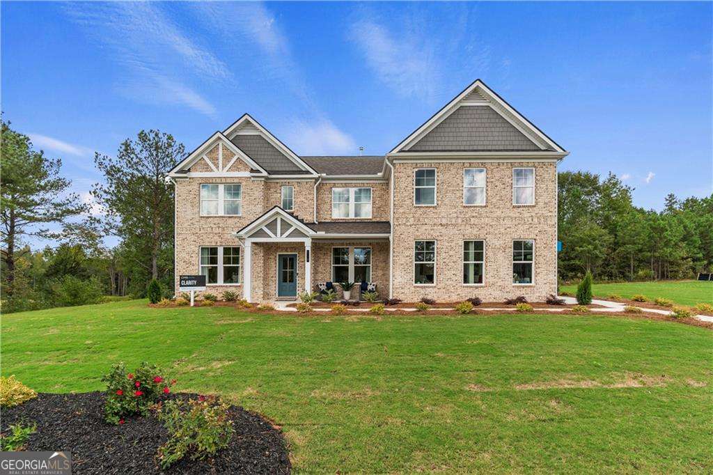 FOUR SIDED BRICK W/BASEMENT! Welcome to Luxury Living at Trinity Park in Coveted McDonough, GA - Built by DRB Homes Step into refined elegance in the prestigious Trinity Park community, where timeless architecture meets modern comfort. This stunning four-sides brick estate showcases the sought-after Clarity floor plan, featuring 5 spacious bedrooms and 4 full bathrooms, thoughtfully designed for both everyday living and elevated entertaining. From the moment you enter, you're welcomed by an open-concept layout with a gourmet kitchen, an expansive island, and seamless flow into the inviting family room-perfect for hosting guests or relaxing in style. The main level offers a full guest suite, while upstairs boasts a spacious loft, three generous secondary bedrooms, a convenient laundry room, and a luxurious owner's retreat complete with a sitting area and a spa-inspired en-suite featuring a soaking tub, glass-enclosed shower, and dual vanities. This exceptional home also includes an unfinished basement, offering endless opportunities to create your dream space-whether a home gym, media room, or additional living area. Luxury, space, and comfort await you in one of McDonough's most desirable communities. Please note: If the buyer is represented by a broker/agent, DRB REQUIRES the buyer's broker/agent to be present during the initial meeting with DRB's sales personnel to ensure proper representation.