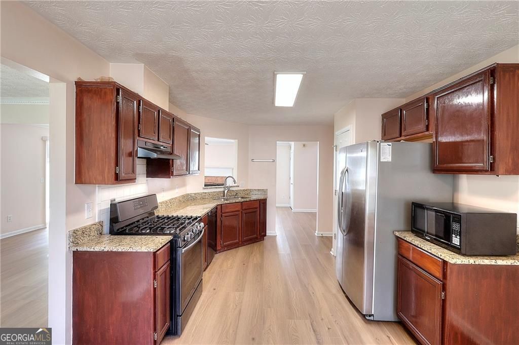 Lilburn, Georgia 30047, United States, 3 Bedrooms Bedrooms, ,3 BathroomsBathrooms,Residential,Active,172862