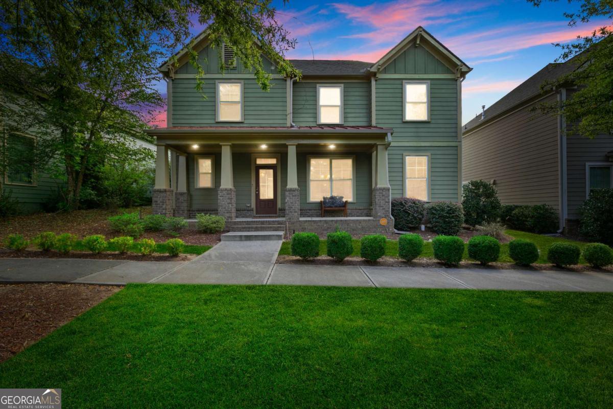 Welcome to Tributary at New Manchester! This spacious 4-bedroom, 2.5-bath home offers open-concept living at its best. The main level features a large dining area and an oversized family room that flows seamlessly into the kitchen, creating an inviting space for both everyday living and entertaining. Beautiful hardwood floors add warmth, while the light-filled sunroom off the living room brings in natural light all day. The kitchen showcases a breakfast bar and rich cabinetry, making it the perfect gathering spot. Upstairs, you'll find oversized bedrooms including a serene primary suite with a sitting area and a massive walk-in closet. Tributary residents enjoy resort-style amenities: two sparkling pools with upper patio deck and fireplace, tennis courts, playgrounds, fitness center with kids' room, and miles of tree-lined sidewalks and walking trails. The HOA even includes internet and cable. Minutes from Sweetwater Creek State Park and a short drive to Hartsfield-Jackson Airport, this home blends comfort, community, and accessibility.