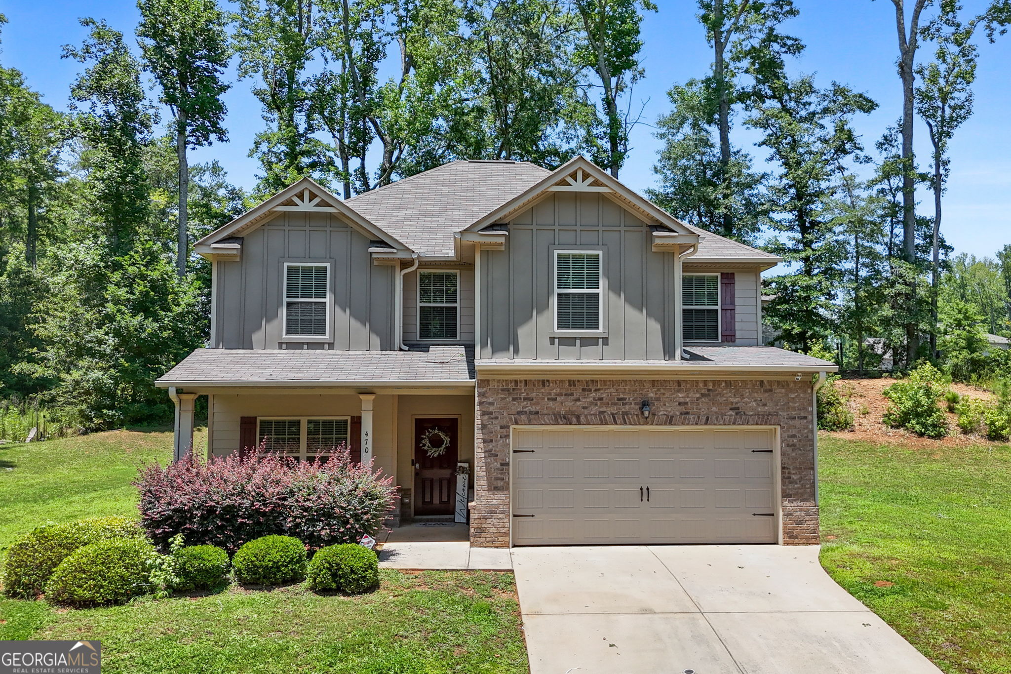 **PRICE REDUCED** Charming Craftsman-Style Home in Locust Grove with Modern Upgrades and Ideal Location! Welcome to this beautifully maintained 4-bedroom, 2.5-bathroom Craftsman-style home nestled in a desirable subdivision within the Locust Grove city limits. Built in 2017 and offering 2,258 square feet of comfortable living space on a spacious 0.50-acre lot, this home combines timeless style with modern convenience. The inviting interior features granite countertops, sleek stainless steel appliances, and a stylish kitchen that includes a bonus-refrigerator stays! The open-concept layout flows effortlessly into the living areas, perfect for both everyday living and entertaining. Upstairs, you'll find generously sized bedrooms and well-appointed bathrooms, including a spacious primary suite with a sitting area (office or baby area) and a large private bathroom. Enjoy the benefits of a community park, all while being just minutes from Tanger Outlet, popular restaurants, and local amenities. With great curb appeal and a location that blends tranquility with accessibility, this home truly has it all. Don't miss your opportunity to own this move-in ready gem-schedule your showing today!
