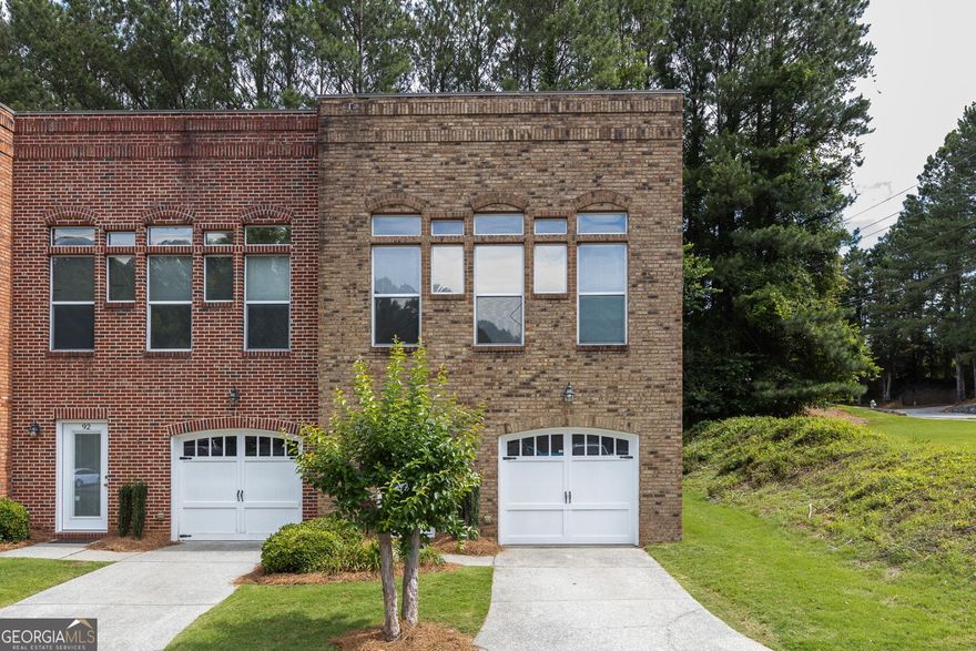 Updated spacious, 3 bedroom, 2.5 bathroom end-unit townhome. Open living room, dining room, kitchen, oversized bedrooms, a 1 car-garage, and cute private back patio. All in a small community that consists of  8 loft style, privately owned and owner managed homes, located in Woodstock's  desirable Towne Lake development. Walk to library, grocery stores, restaurants and minutes from renovated downtown Woodstock with many amenities. Highly-rated school district includes Etowah High School and Bascomb Elem. Very convenient location.