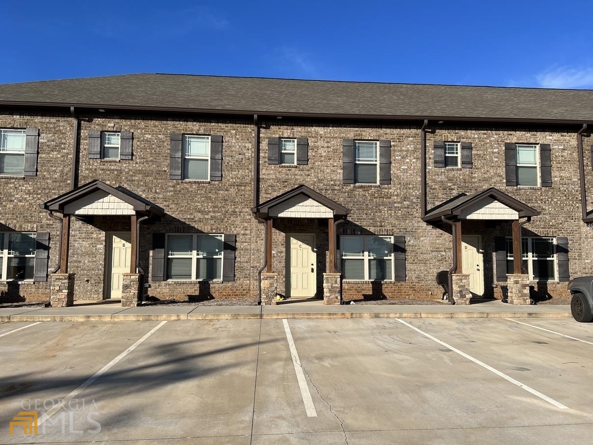 Beautiful upgraded 2 Bedroom, 2.5 Bath Townhome in Jackson just minutes from everything. Open floorplan with hardwood flooring throughout, spacious family room open to granite & stainless steel kitchen, pantry, breakfast area, breakfast bar, two oversized bedrooms upstairs with walk-in closets & private baths with granite vanity and tiled tub/shower, laundry room, 1/2 bath, patio, storage room & 2 parking spaces. Lawn care and trash pickup included in rent.