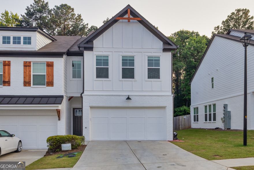 Welcome to this charming Craftsman-style townhome in the desirable Townes of Auburn community! Built in 2022, this 3-bedroom, 2.5-bath home offers modern comfort with timeless character. Step inside to a warm and inviting living space, perfect for relaxing or entertaining. The thoughtfully designed layout features spacious bedrooms, a bright and airy kitchen, and stylish finishes throughout. Enjoy the low-maintenance lifestyle of townhome living with the feel of a single-family home-all in a vibrant, growing neighborhood.