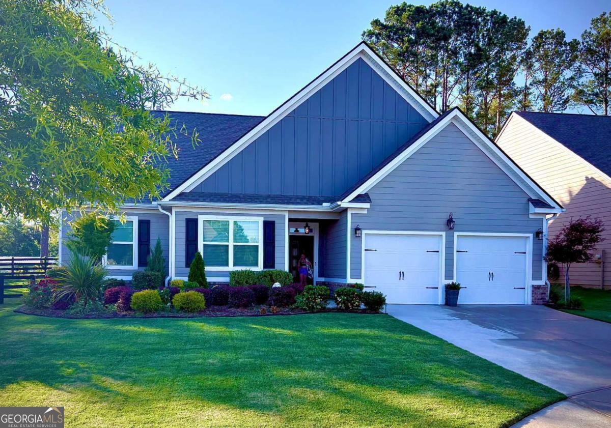 Discover effortless living in this charming 4-bedroom, 2-bath single story home in Sought After Madison Lakes Subdivision. Nestled in a gated community, this home offers the perfect balance of comfort, convenience, and a vibrant lifestyle. Step inside to the open-concept design, where you'll find the family room open to the kitchen that's full of modern appliances, generous storage, and a central island, perfect for baking or entertaining. The spacious primary suite is a true retreat, filled with natural light. With its peaceful atmosphere and private en-suite bathroom, it's the perfect space to unwind after a busy day. Outside, the covered back porch offers a cozy spot to enjoy your morning coffee, share meals with loved ones, or simply relax and take in the fresh air. With a low-maintenance yard, you'll have more time to enjoy the things you love, both at home and in the community. Living in Madison Lakes means access to incredible amenities, including a swimming pool, Tennis Courts