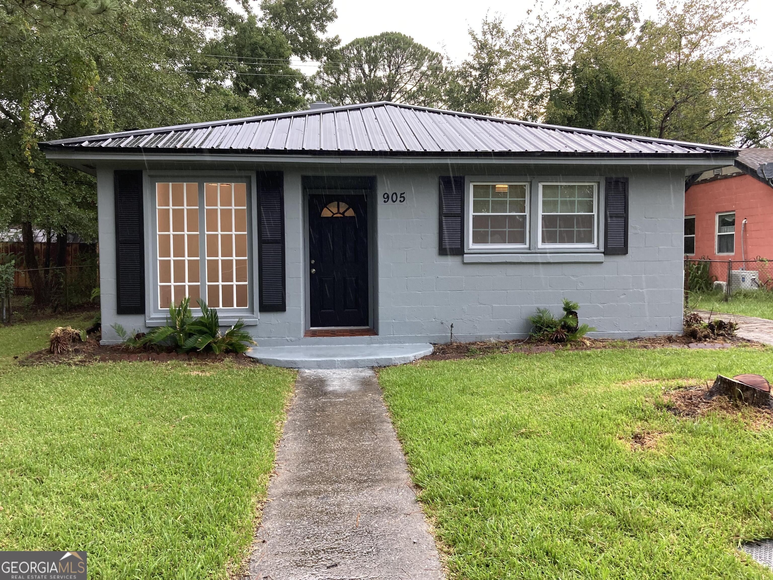 Welcome to this charming home located at 905 Cubbedge St in Savannah, GA. This home has been recently updated with a new roof, flooring, windows, appliances, drywall, paint and more. This property offers a cozy and inviting atmosphere with its well-designed layout. The interior features spacious living areas, appropriate for entertaining. The kitchen is equipped with modern appliances and ample counter space. Enjoy the comfort of the generously sized bedrooms and updated bathrooms. The backyard provides a great space for outdoor activities. Conveniently located near enmark arena, city market, river street and many local amenities and attractions.
